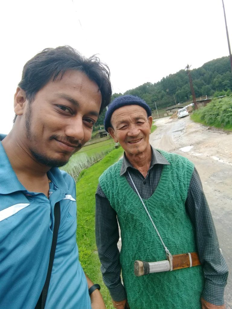 An Apatani Elder and his Daao, Hong Village - Ziro Valley